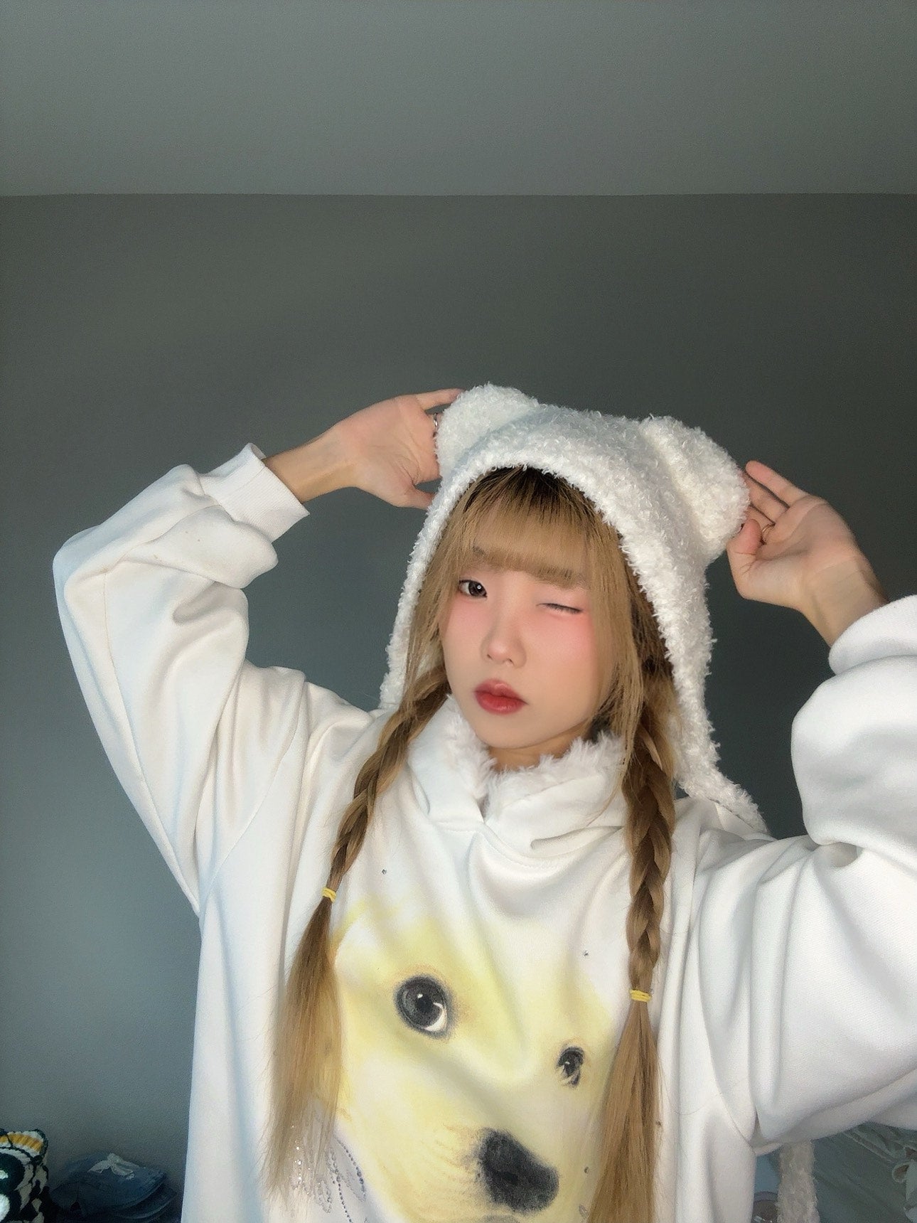 White Fuzzy Bear Hat – Cute Winter Tie Beanie with white sweater.