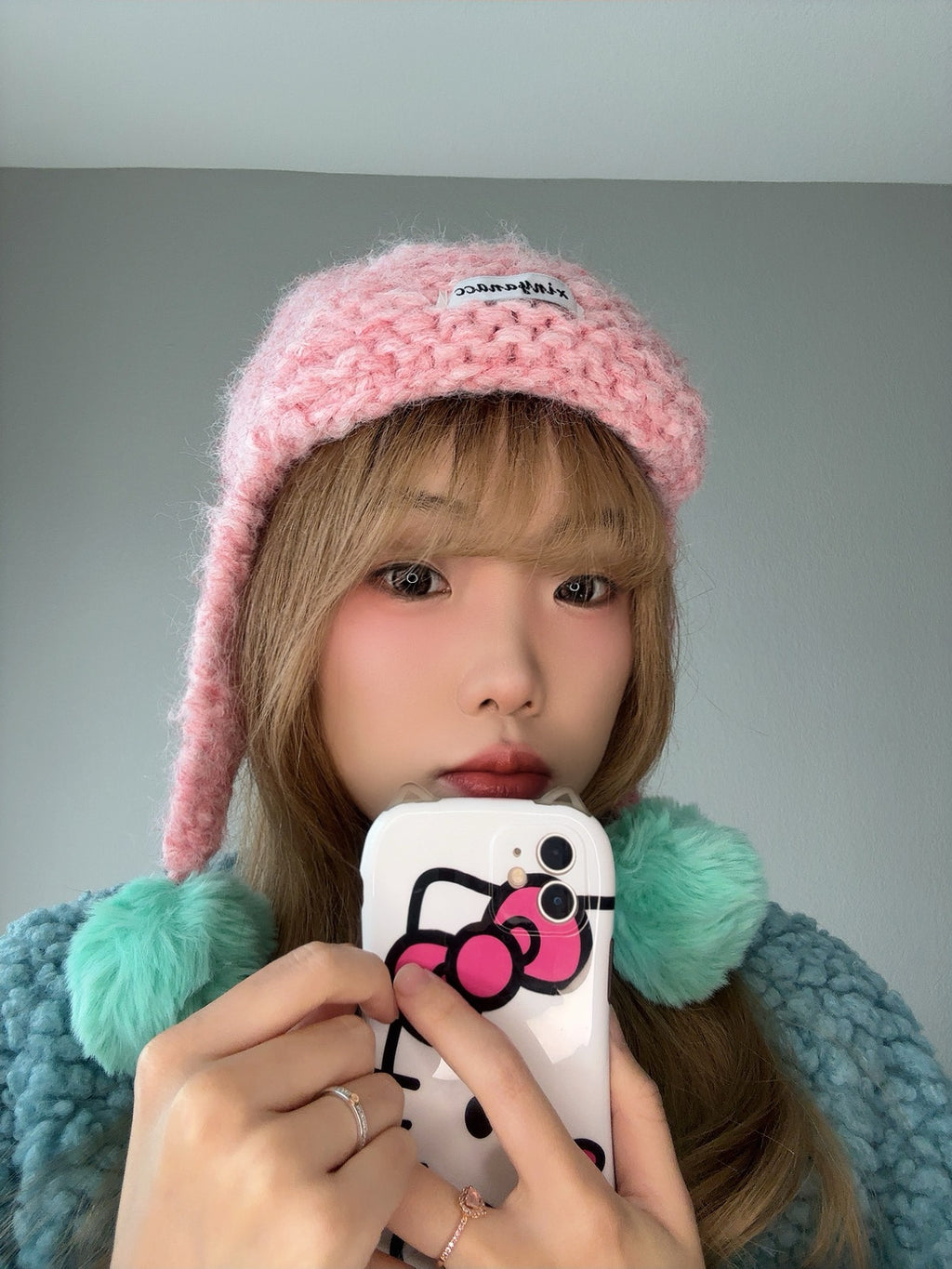 Pink Pom Pom Knit Hat – Cute Winter Beanie close up view.