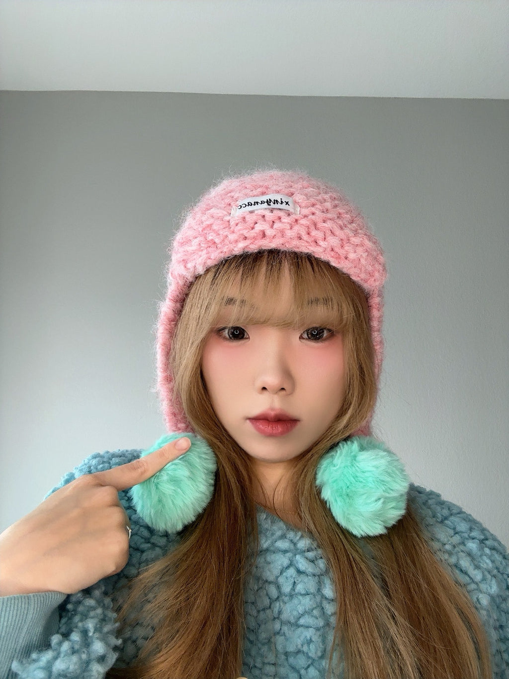 Pink Pom Pom Knit Hat – Cute Winter Beanie side view.
