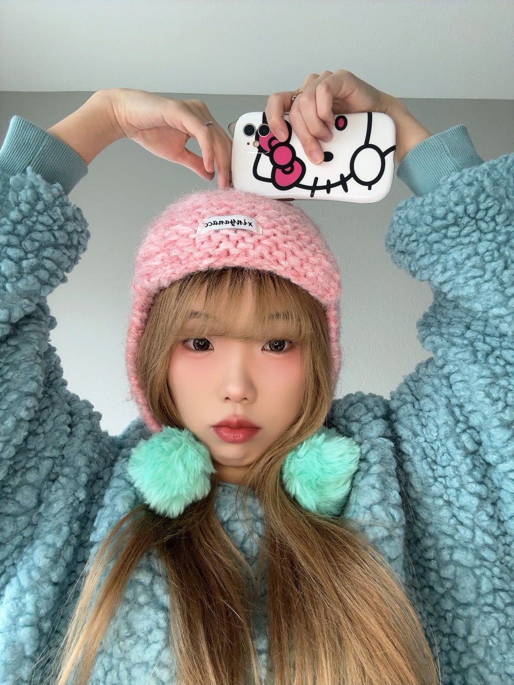 Pink Pom Pom Knit Hat – Cute Winter Beanie top view.