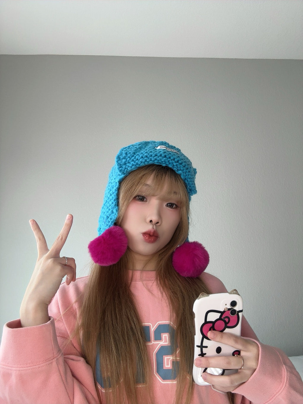 Blue Pom Pom Knit Hat – Colorful Winter Beanie far view.