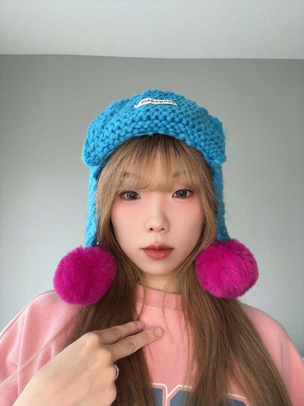 Blue Pom Pom Knit Hat – Colorful Winter Beanie close view.