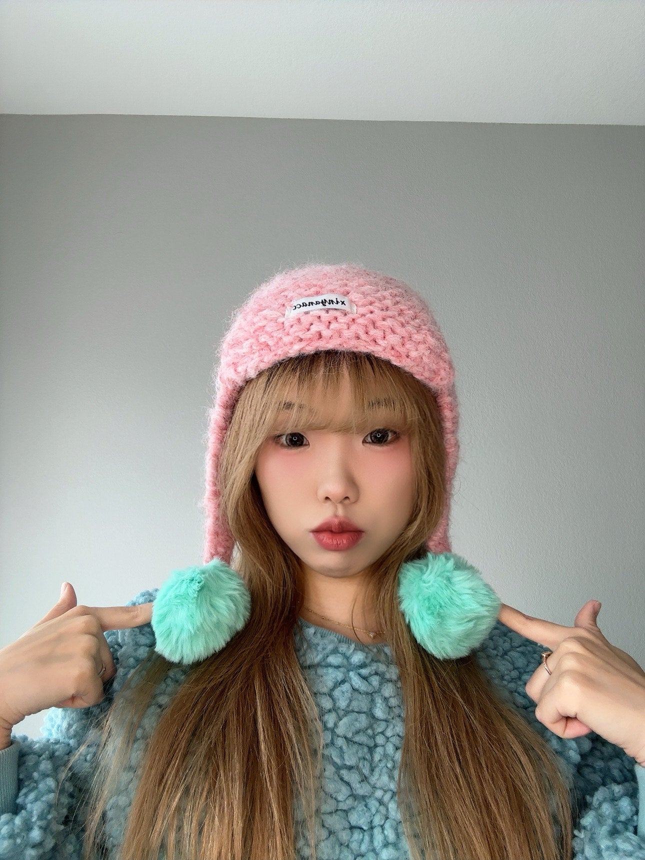 Pink Pom Pom Knit Hat – Cute Winter Beanie front view.